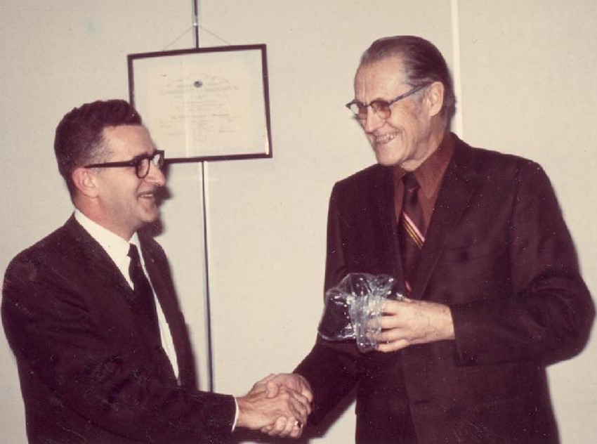 cj04 - Pierre Arpin congralating Nels Harvey